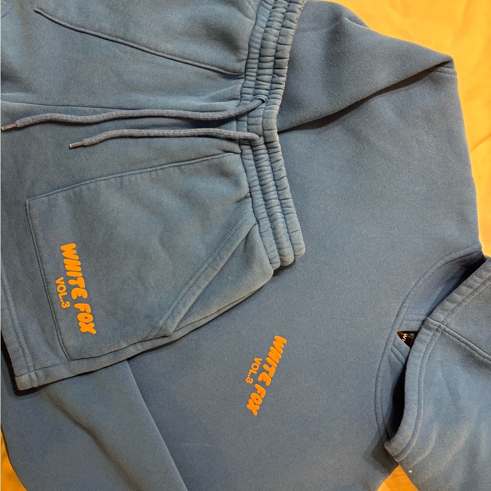 White Fox Boutique Blue Sweatpants with Orange Logo